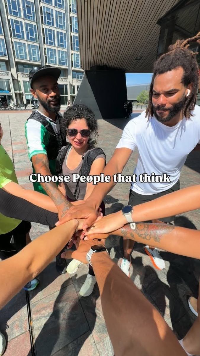 Hands together before a LEVELS Run Club session in Rotterdam